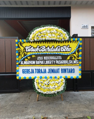 Papan Bunga Duka di Pelabai
